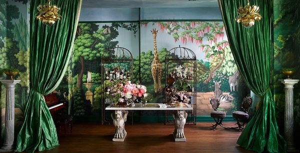 Classic De Gournay wallpaper in a chic hallway