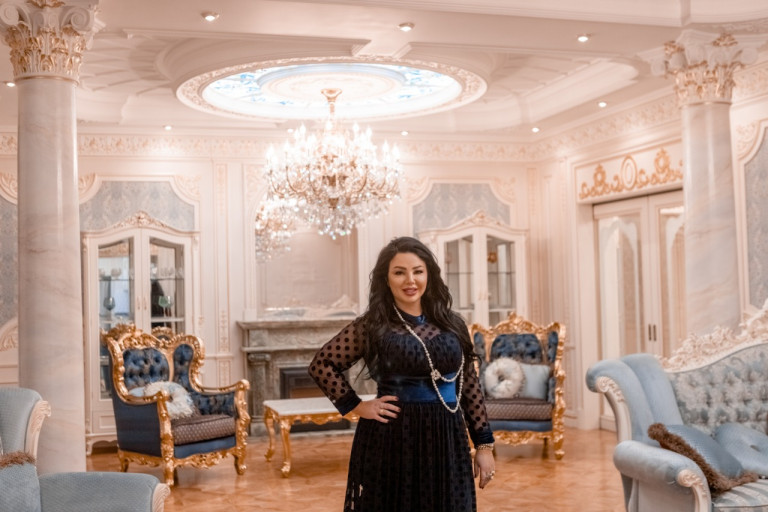 Opulent living room with gold accents and royal interior design