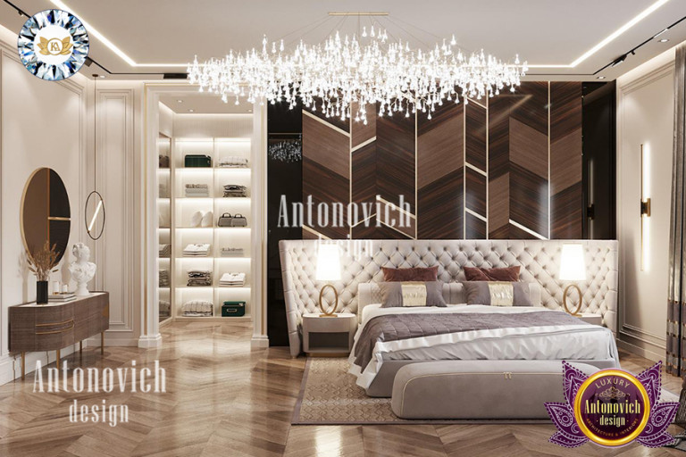 Luxurious bedroom featuring a statement chandelier and cozy seating area