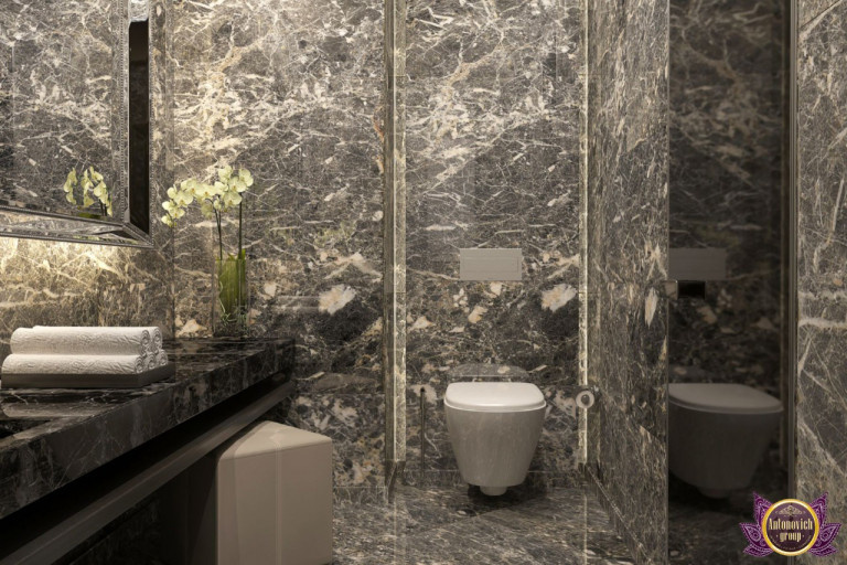 Exquisite marble bathroom with gold accents and a stunning chandelier