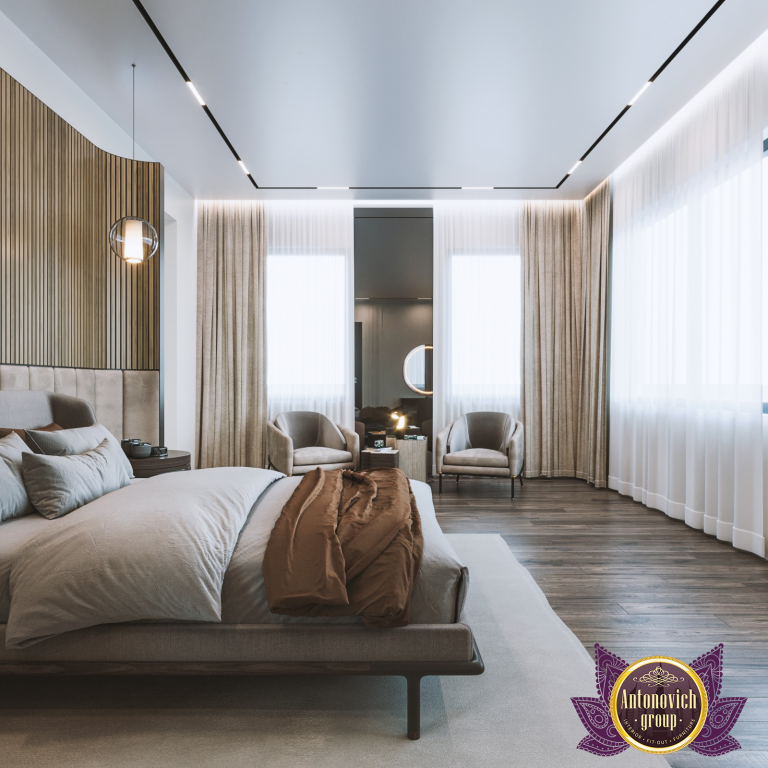 Elegant brown bedroom featuring a sophisticated chandelier