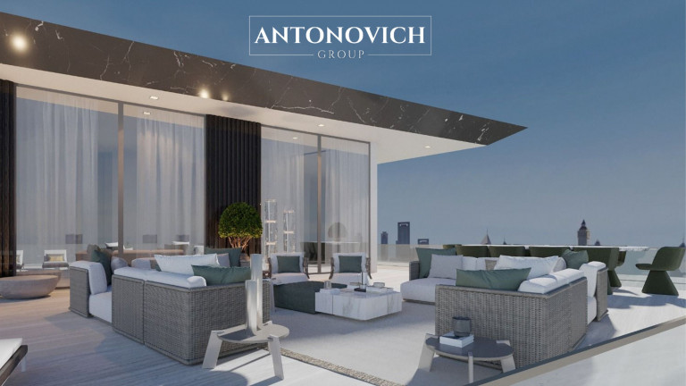 Luxurious Roof Deck Swimming Pool Design with a Sitting Area by Antonovich Group