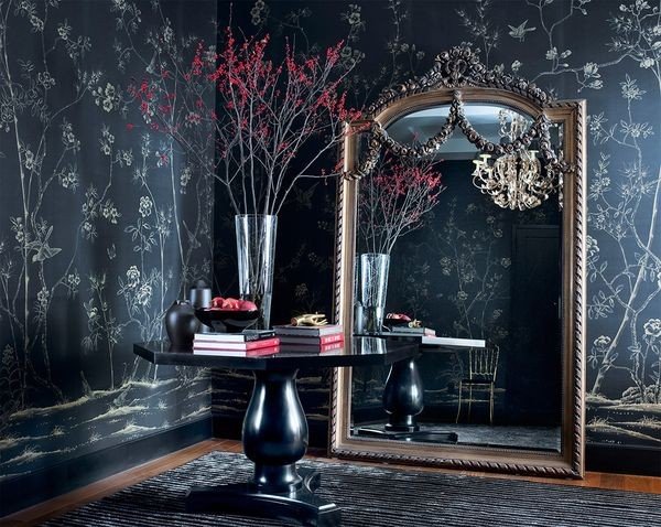 De Gournay's captivating wallpaper in a glamorous bedroom