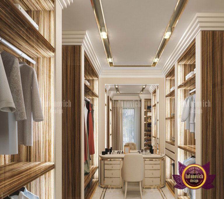 Luxurious closet space with floor-to-ceiling mirrors and sleek cabinetry