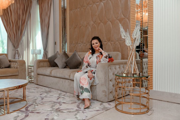 Elegant chandelier illuminating a luxurious living room