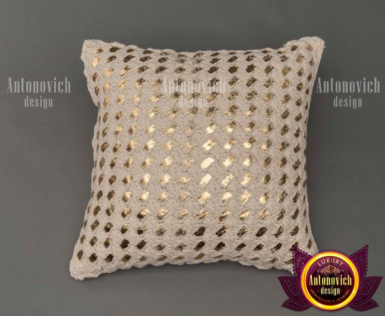 Vibrant boho-inspired pillow on a trendy couch