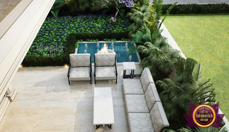 Sophisticated landscape design featuring lush greenery and water features