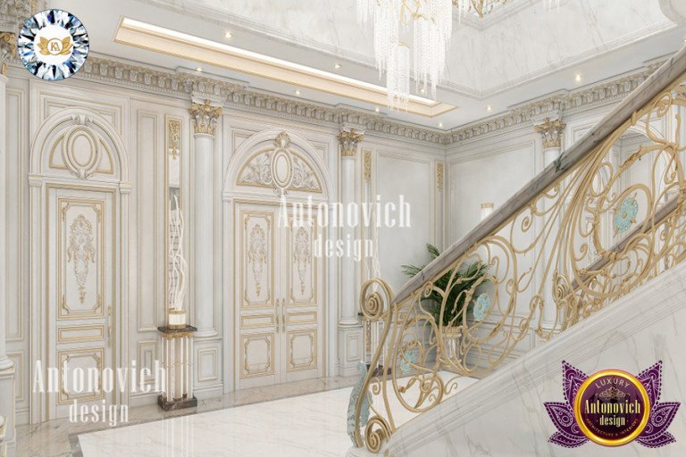Stunning spiral staircase with gold accents by Antonovich Design