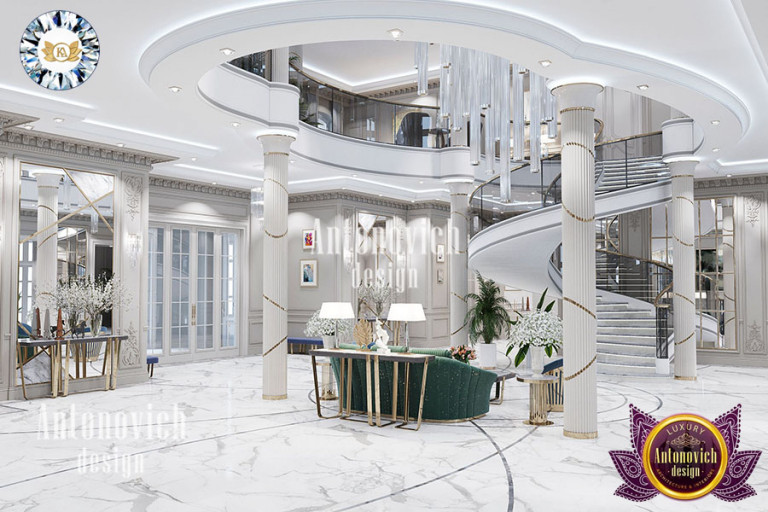 Grand entrance hall with marble flooring and majestic staircase