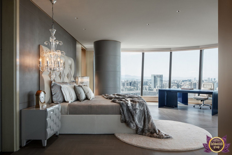 Chic bedroom seating area with plush chairs and accent table