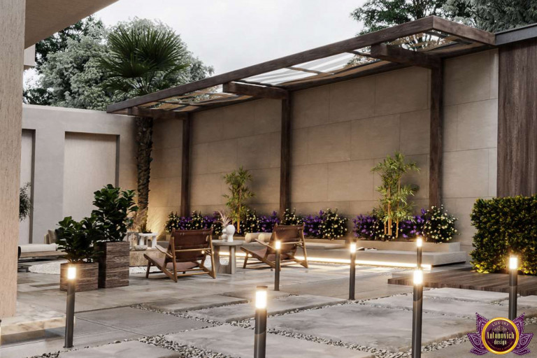 An elegant outdoor seating area in a Dubai landscape, surrounded by vibrant plants and stylish decor