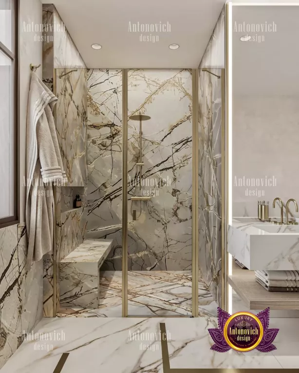 Stunning marble bathroom design with gold accents in Dubai