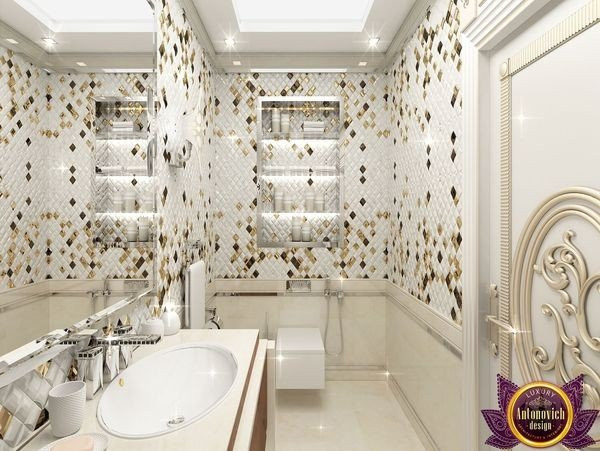 Elegant bathroom with marble countertops and gold accents