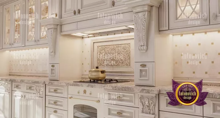 Elegant marble countertops and gold accents in a luxurious kitchen