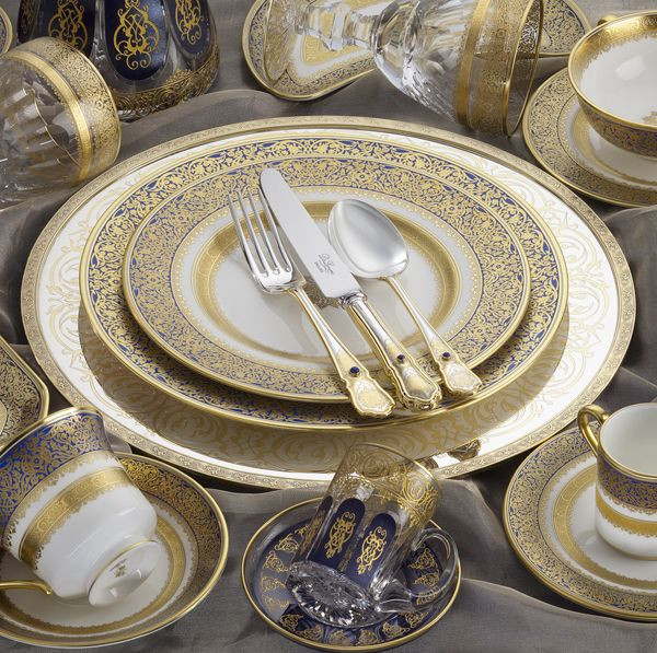 Elegant fine china set with gold accents