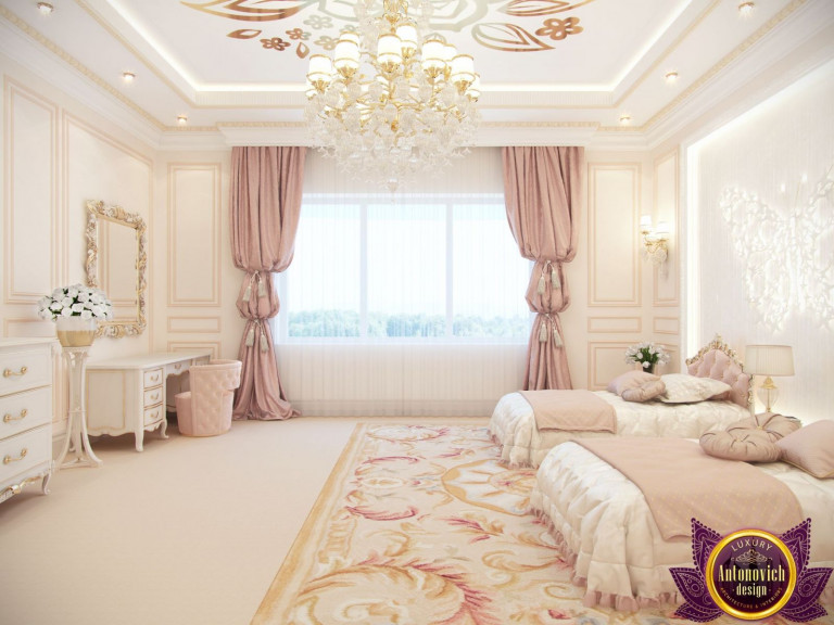 Beautiful pink and white girls' room with canopy bed