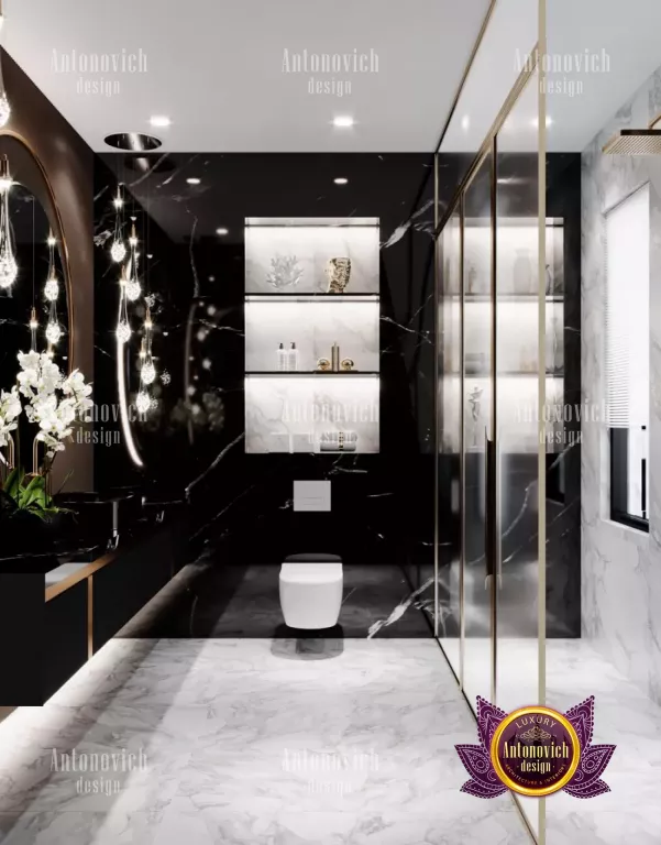 Elegant marble bathroom with freestanding bathtub and gold accents