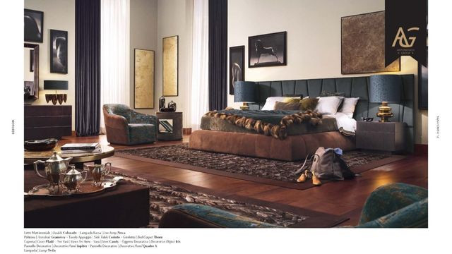 Elegant Antonovich bedroom set with plush headboard and stylish accents