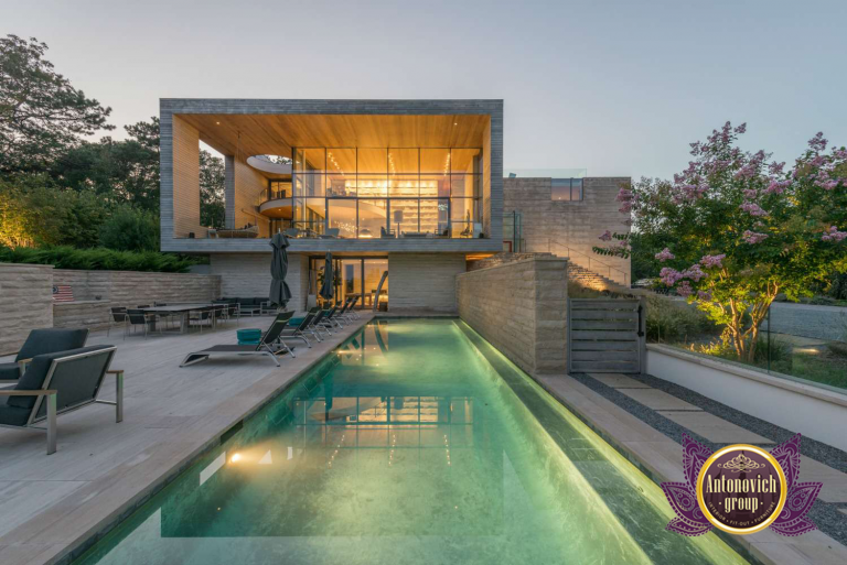 Modern backyard oasis featuring a sleek pool design