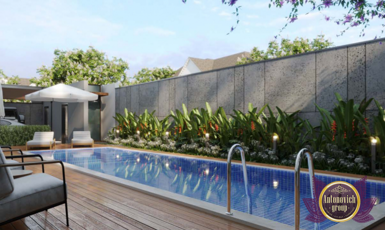 Modern villa pool design with stylish outdoor furniture