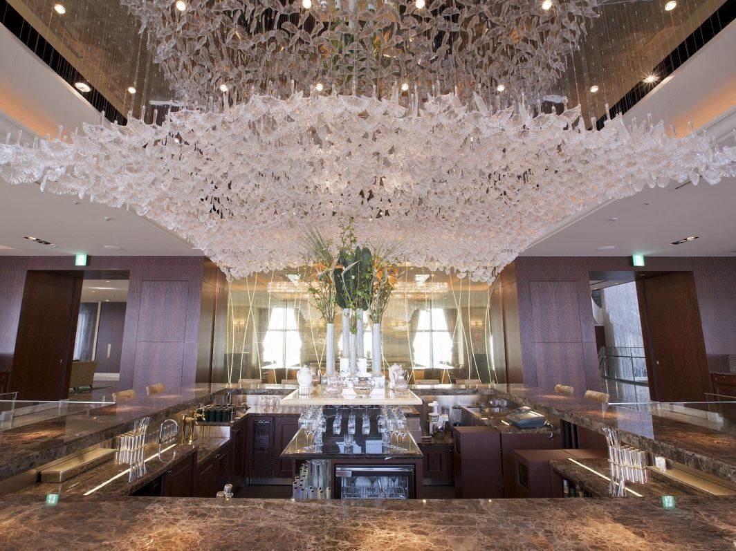 Opulent crystal chandelier in a grand living room