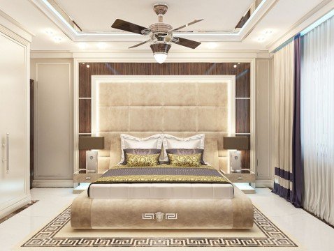 Luxurious and modern living room with white and golden colors, creating a perfect atmosphere for relaxation and comfort.