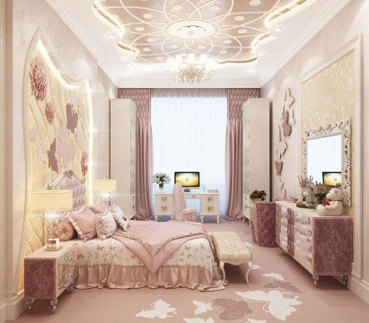 This is a picture of an elegant and luxurious bedroom. The room is decorated in a predominantly pastel pink and grey color palette, and features ornate, tufted furniture. The bed is a four-poster design, with light grey curtains draped around it. An ornate chandelier hangs overhead, providing soft illumination to the room. There is also a small table with two chairs next to the bed, adding a cozy and inviting touch to the decor.