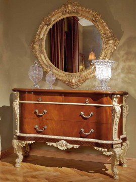 Grandiose luxurious bedroom design in beige and golden colors with wall paneling, marble floor and beautiful chandelier.