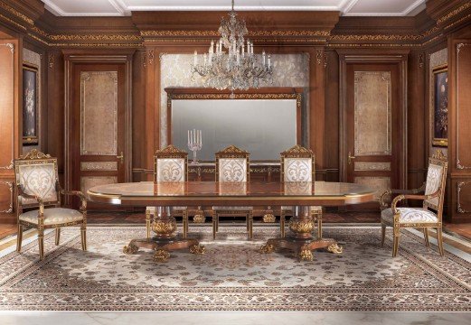 This picture shows an interior hallway of a luxury home. The hallway features a lavish marble floor with a contemporary pattern and an intricately designed archway along one side. The walls are painted a muted gray color and have modern sconces placed around the perimeter of the room. The ceiling features a series of recessed lights. At the end of the hallway, there is a large window which looks out onto a balcony, allowing natural light to fill the space.