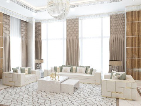 This image displays a luxurious bedroom, with a large bed, decorated with silver and gold accents, and an elegant carpet.