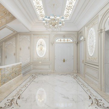 This picture shows a luxurious and modern bathroom design. The walls are covered with marble tiles in white, brown and beige colors, creating a warm and inviting atmosphere. There is a large pedestal sink and a vanity with a dark wood countertop, providing both convenience and style. The floor is tiled and features a pattern that adds elegance to the overall look. A freestanding bathtub stands in the middle of the room, surrounded by a glass shower enclosure. Finally, two stylish wall sconces provide minimal lighting for the bathroom.