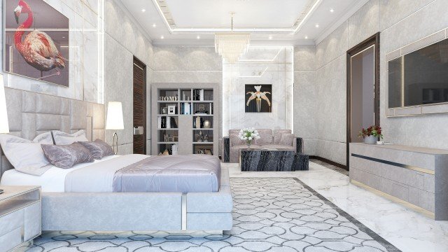A contemporary interior featuring white marble walls and flooring, with bronze-colored accents and a minimalist fireplace.