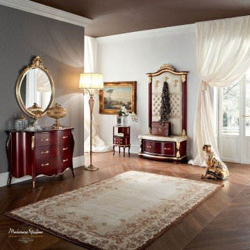 A luxurious modern bedroom featuring an elegant chandelier, a magnificent bed with a canopy and a stylish carpet.