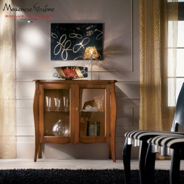 Luxurious modern office composed of rich black furniture, marble walls and golden accents making it a perfect workspace.