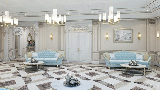 This picture shows a luxurious interior design in a spacious living room. The room features a grand white sofa, set against white walls and a floor of clean white marble. The furniture, including the sofa and two armchairs, are covered with gold-colored cushions and upholstery. A large gold-leaf chandelier hangs from the ceiling, and a magnificent gold-colored mirror hangs on the wall above the sofa. On the floor is an elegant cream-colored rug, and there is a large window that overlooks the outside.