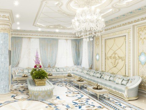 This picture shows an ornate, luxuriously decorated interior. It comprises of a modernly furnished living room with beige and gold accents, along with a white marble fireplace surrounded by tall gilded mirrors. The room is lit up with a large crystal chandelier hanging from the ceiling, and two matching floor lamps. At one side of the room stands a grand piano, and there is a golden-framed window overlooking the adjacent area.
