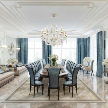 This picture shows a luxurious modern dining room interior design. The walls are painted in a warm beige color and lined with ornate wooden paneling. There is an eye-catching gray stone feature wall near one corner, which is decorated with a large mirror framed in gold. A round marble dining table is surrounded by six white chairs with gold accents. On the ceiling, there are three stunning modern light fixtures that provide ample lighting for the space.