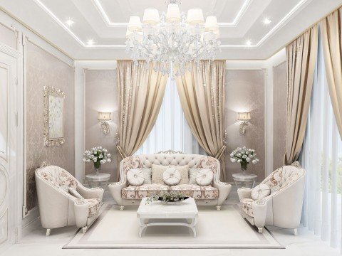 The picture shows a grand, elegant entryway with white marble floors, tall gold columns, and ornate ceiling detail. The walls are painted a light shade of blue and are adorned with large white crown molding. In the center of the room is a luxurious chandelier that hangs from the top of the ceiling. To either side of the door is an open archway with beautiful sconces adorning the walls just above the doorways. The door itself is an intricate glass-paneled design with gold details.