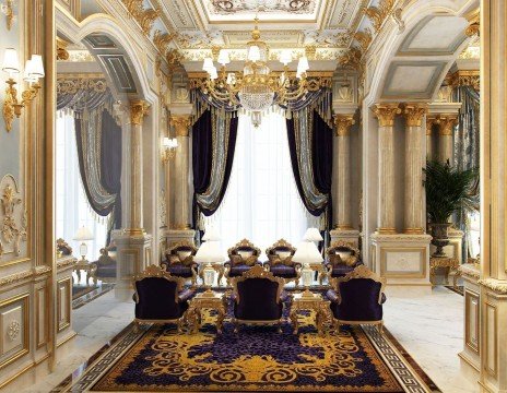 This picture shows an ornately detailed luxury staircase with a beautiful gold railing and decoratively carved dark hardwood steps. The balustrade curves gracefully around the staircase as it ascends, leading to a landing and a large window letting in light from above. Delicate glass chandeliers hang at regular intervals along the sides of the stairs, adding a touch of elegance and sophistication.