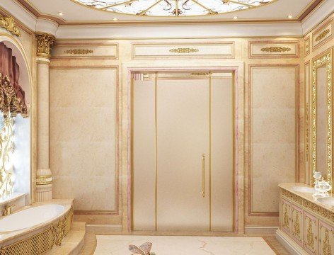 This picture shows a modern luxury staircase in an entryway. The stairs have a marble inlay with a detailed wooden railing that wraps around the sides and up the center. The ceiling above the staircase is ornate with a unique pattern of golden and ivory accents. The walls are decorated with textured wallpaper, and the entryway has a classic chandelier hanging from the ceiling.