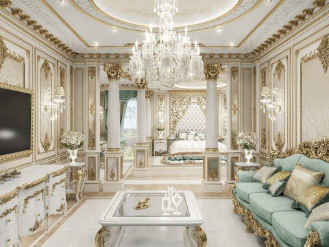 This is a picture of an incredibly luxurious living room. It features a tufted white leather sofa with a matching ottoman, as well as two unique armchairs covered in white fabric. The walls are lined with gold and dark wood panelling, and there is a stunning crystal chandelier hanging from the ceiling. The floor is covered in a checkered pattern of black and white tiles.