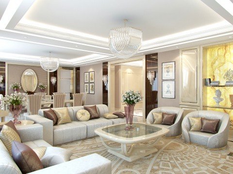 This picture shows a large, grand luxury living area. The walls are adorned with stunning wallpaper with white and gold accents. There is an opulent crystal chandelier suspended from the ceiling and the floor is lined with polished marble tiles. The furniture is luxurious and sophisticated, with an oversized white sofa, two comfortable armchairs and a round coffee table in the center. There are elaborately framed paintings hung on the walls, and the room has plenty of light thanks to the large windows.