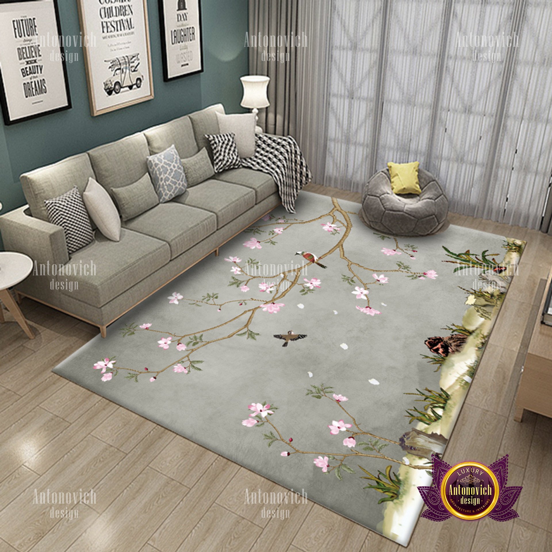 This picture shows a luxurious living room with an elegant style. The walls are painted a soft gray and the furniture is white. There is a deep gray sofa and two armchairs, along with a round coffee table. On one wall is a modern art piece and it is illuminated by a contemporary chandelier. The curtains are a sheer white, and there is a natural rug to finish off the room.