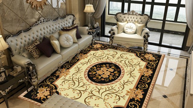 This picture is a rendering of a luxurious living room designed by Antonovich Design. The room features a neutral color palette, with white walls and tan-colored furniture. There are two sofa chairs and a large round ottoman in the center of the room. The floor appears to be marble and there are tables located on either side of the sofa chairs. The room also has several decorative pieces such as a rug, artwork on the walls and a crystal chandelier.