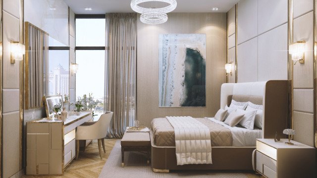 This picture shows a modern and luxurious living room with a gray velvet sofa, white marble floors and walls, and various golden accents. A crystal chandelier hangs from the ceiling and two glass end tables are featured next to the sofa. A large golden gilded mirror adds some opulence to the room, while beautiful artwork hangs on the wall. In addition, there is a grand piano and a coffee table in front of the sofa.