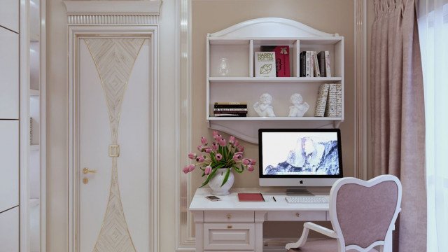 This picture shows a luxurious modern home interior designed by Antonovich Design. The room is decorated with beautiful furniture and art pieces, a large ornate mirror, and intricate light fixtures. The walls are painted in a soft beige color with gold accents and the floor is covered with a plush white rug. There is also a grand marble staircase in the center of the room leading up to a mezzanine level.