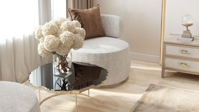 This picture shows a luxurious living room interior designed by Antonovich Design. It features a curved stone wall with gold details and a round marble floor. The seating area includes a white leather sofa and two black armchairs, along with an upholstered ottoman in the center. The walls are adorned with expensive artwork, while several ornamental plants provide a touch of greenery. Gold accents throughout the space give the room a rich, elegant feel.