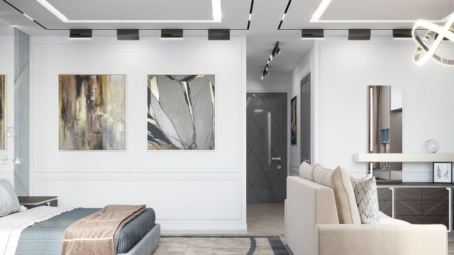 This picture shows an interior design of a luxurious and modern living room. The room features contemporary furniture, including a black leather sofa, a white armchair, two glass-top side tables, and two abstract art pieces on the wall. The walls are painted with a light color and the floors are covered with a dark wood. There is a round window in the corner of the room, allowing natural light to enter.