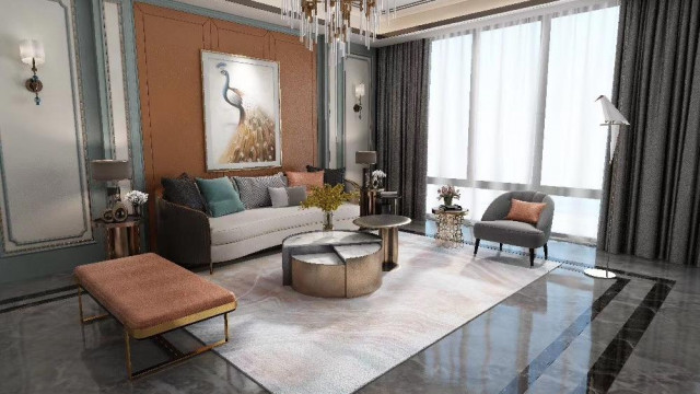 jpgThe picture shows a luxurious modern living room. The room has an elegant cream-colored sofa, two matching armchairs, and a light brown coffee table. There is also a beige area rug on the floor and chandelier lights hanging from the ceiling. The walls are decorated with a variety of framed artwork and luxury wall mirrors, and the wall behind the sofa features a built-in fireplace.