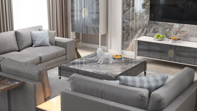 This picture shows a luxurious and modern white lounge area with a fully upholstered, off-white sofa, two armchairs, and a rectangular glass center table. The walls in the room are decorated with large, abstract art pieces and floor lamps in the corners of the room. The overall look is elegant and inviting, perfect for relaxing and entertaining.